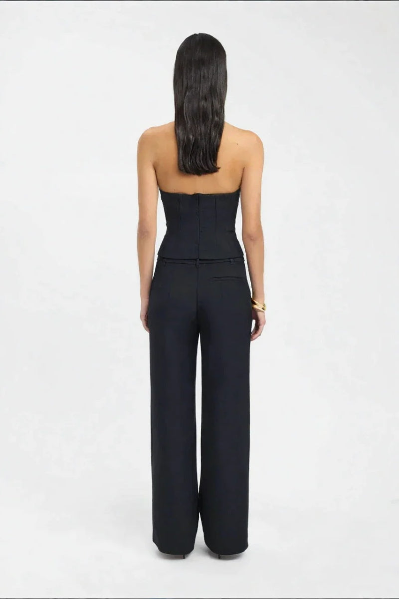 Top bustier negro sin tirantes con recortes