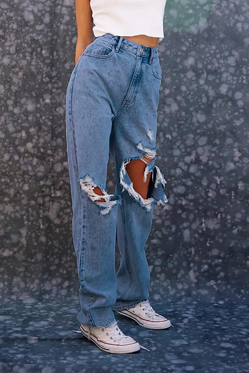 Zomerse losse rechte broek met gescheurde jeans