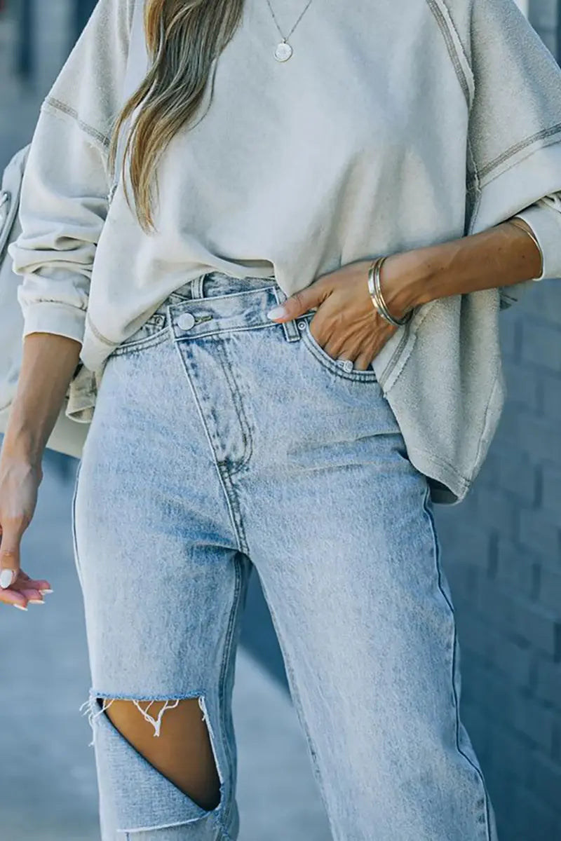 Trendy asymmetrische distressed spijkerbroek