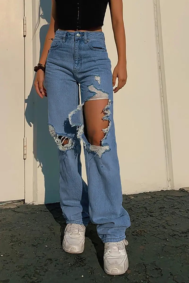 Zomerse losse rechte broek met gescheurde jeans