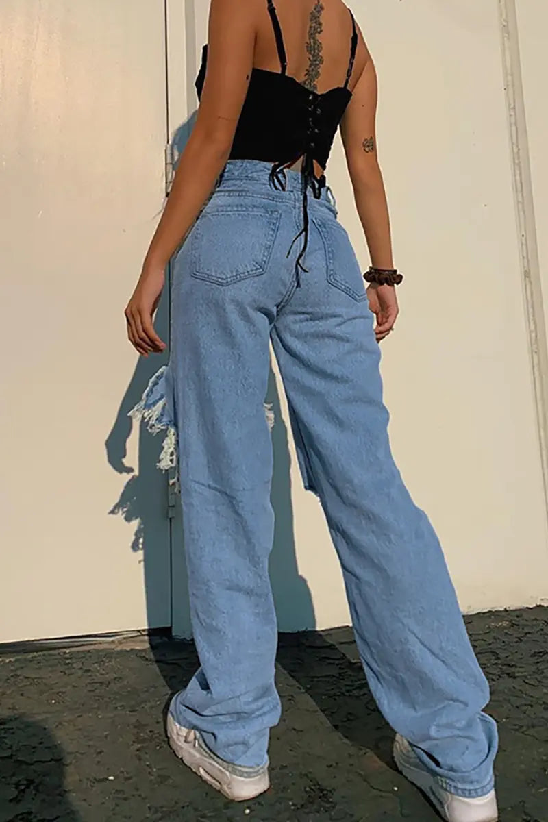 Zomerse losse rechte broek met gescheurde jeans