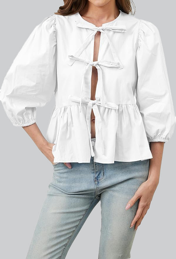 Blouse met pofmouwen, peplum en strik