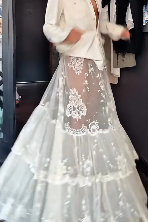 Falda larga de encaje floral transparente